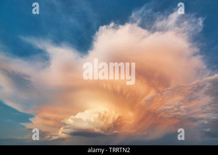 Cloudy stormy dramatic sky with lightning strike. Thunder cloudscape. Meteorology Stock Photo