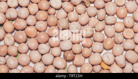 Close up pile of Peas flour beans texture, background pattern. Natural grains and cereals. Agricultural product design element. Seamless colorful canv Stock Photo