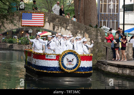 The annual veterans services parade taking place along the River Walk in San Antonio, Texas, USA Stock Photo
