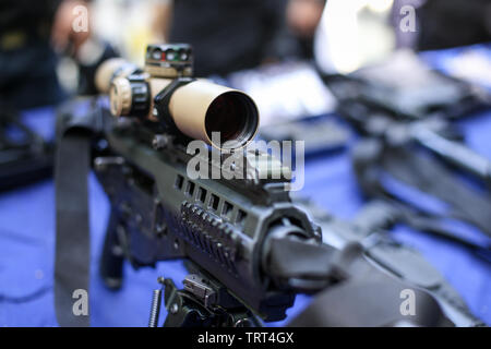 Scope on a tactical assault rifle Stock Photo