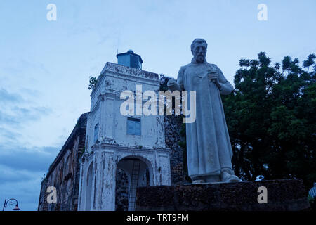 Statue of St Francis Xavier in front of Saint Paul Church in Malacca City Malaysia Stock Photo