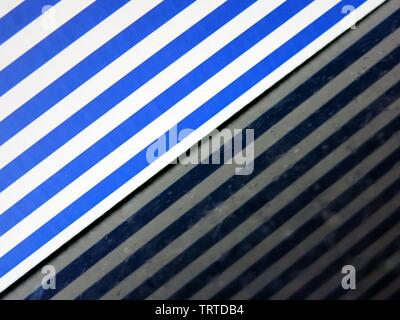 Reflection of lined box on black granite. Stock Photo