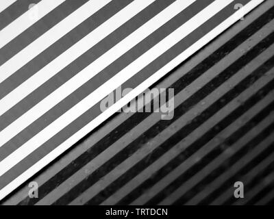 Reflection of lined box on black granite. Stock Photo