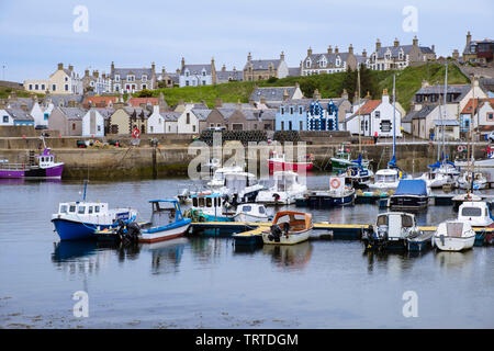 Boats moored in harbour of fishing village on Moray Firth coast. Findochty, Morayshire, Scotland, UK, Britain Stock Photo