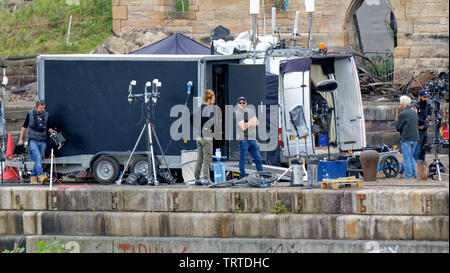 Glasgow, Scotland, UK 12th June, 2019. Smoke on the water as Steven Spielberg first world war movie “1917”  continues filming in the Govan graving docks on the banks of the river Clyde in the city today as Sam Mendes directs fanous actors dressed as britishww1 soldiers with period trucks. Credit: Gerard Ferry/ Alamy Live News Stock Photo