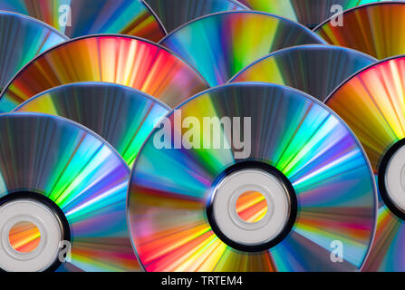 Vintage CD or DVD disk background, old circle discs used for data storage, share movies and music Stock Photo