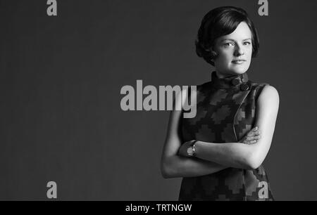 ELISABETH MOSS in MAD MEN (2007). Copyright: Editorial use only. No merchandising or book covers. This is a publicly distributed handout. Access rights only, no license of copyright provided. Only to be reproduced in conjunction with promotion of this film. Credit: AMERICAN MOVIE CLASSICS (AMC)/RADICAL MEDIA / Album Stock Photo