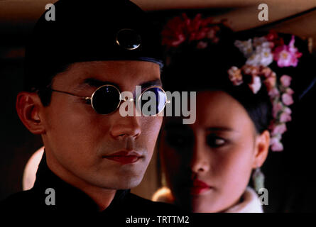 JOAN CHEN and JOHN LONE in THE LAST EMPEROR (1987). Copyright: Editorial use only. No merchandising or book covers. This is a publicly distributed handout. Access rights only, no license of copyright provided. Only to be reproduced in conjunction with promotion of this film. Credit: COLUMBIA PICTURES / Album Stock Photo