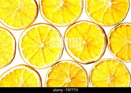 Pattern of dried orange slices isolated on white background Stock Photo