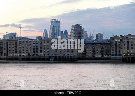 London River Thames homes apartments living Wapping flats on river view from Rotherhithe and City of London skyscrapers in England UK  KATHY DEWITT Stock Photo