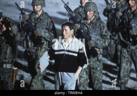 TAKESHI KITANO in BATTLE ROYALE (2000) -Original title: BATORU ROWAIARU-. Copyright: Editorial use only. No merchandising or book covers. This is a publicly distributed handout. Access rights only, no license of copyright provided. Only to be reproduced in conjunction with promotion of this film. Credit: BATTLE ROYALE PRODUCTION COMMITTEE / Album Stock Photo