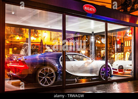 Bugatti Chiron car on display in huge showcase, night, Strasbourg, Alsace, France, Europe, Stock Photo