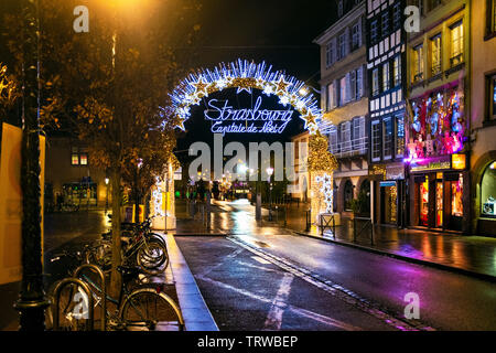 Illuminated arch, Christmas market main entrance gate, Capitale de Noël, Christmas capital, empty street night, Strasbourg, Alsace, France, Europe, Stock Photo