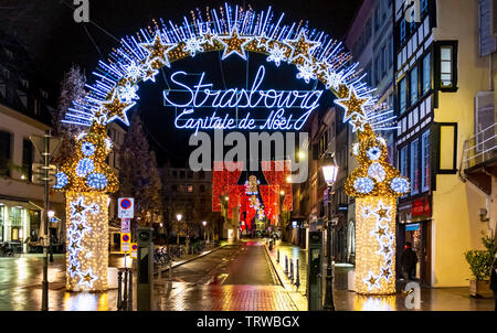 Illuminated arch, Christmas market main entrance gate, Capitale de Noël, Christmas capital, empty street night, Strasbourg, Alsace, France, Europe, Stock Photo