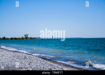 Beautiful sunny day at the beach by the lake Stock Photo