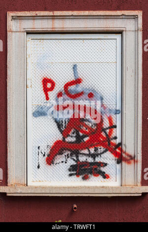 communist party symbol sprayed on a window Stock Photo