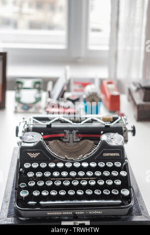 Old German " Continental" typewriter machine on desktop- selective focus Stock Photo