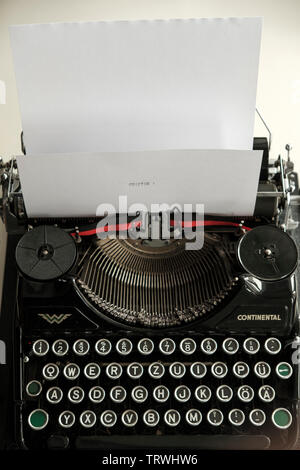 Chapter One- old typewriter with  black white sheet of paper- writers block concept Stock Photo