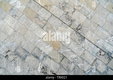 The texture of the gray tile is located diagonally. Stock Photo