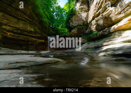 Water flowing down La Salle Canyon in Starved Rock State Park on a beautiful Spring morning.  Illinois, USA Stock Photo