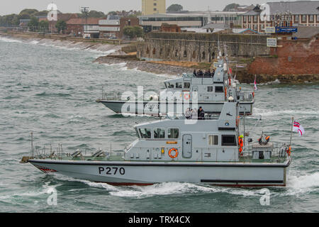 Royal Navy patrol boats HMS Biter (with the sharks teeth artwork on the bow) and HMS Pursuer seen together leaving Portsmouth Harbour, UK on 4/6/19. Stock Photo
