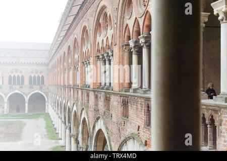 Pavia, Italy. November 11 2017. Castello Visconteo (Visconteo castle) on a foggy day. Stock Photo