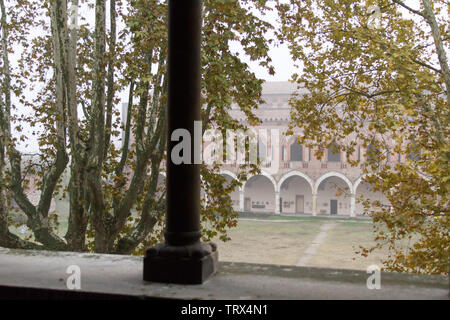 Pavia, Italy. November 11 2017. Castello Visconteo (Visconteo castle) on a foggy day. Stock Photo