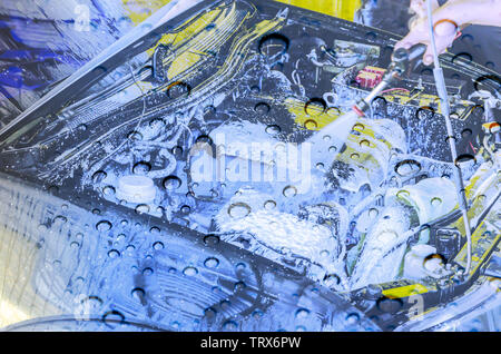 Detail cleaning inside the engine With car wash foam Stock Photo