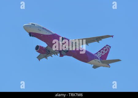 Osaka, Japan - Apr 18, 2019. Peach Aviation JA817P (Airbus A320) taking off from Kansai Airport (KIX) in Osaka, Japan. Stock Photo