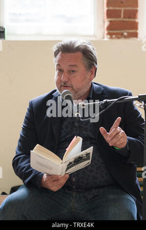 Pete Brown, award winning British author, discusses his latest book Pie Fidelity at the 2019 Stoke Newington Literary Festival in Abney Hall Stock Photo