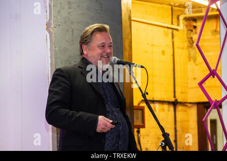 Pete Brown, award winning British author, discusses his latest book at the 2019 Stoke Newington Literary Festival on stage in the Library Gallery Stock Photo