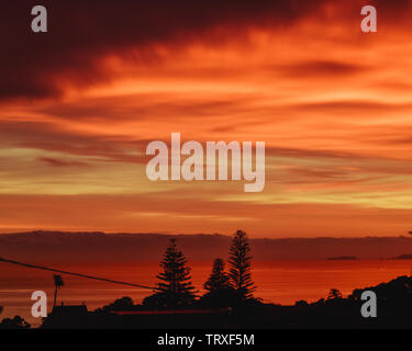 Early Morning Sunrise in Takapuna, Auckland, New Zealand Stock Photo