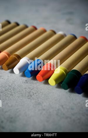 Group of wax crayons on a table.