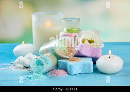 Composition with Aromatic salts in glass bottles,  on blue background Stock Photo