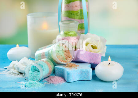 Composition with Aromatic salts in glass bottles,  on blue background Stock Photo