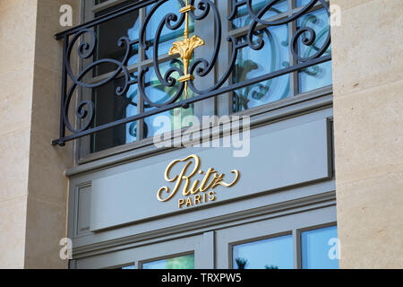 PARIS, FRANCE - JULY 21, 2017: Ritz, luxury hotel golden sign in place Vendome in Paris, France. Stock Photo