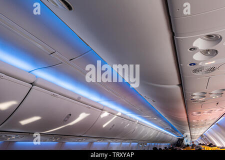 Overhead ceiling panels with lighting and air conditioning controls on ...