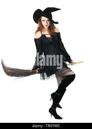 Halloween witch with broom isolated on white Stock Photo