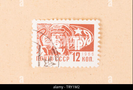 CCCP - CIRCA 1966: A stamp printed in the CCCP shows a working man, circa 1966 Stock Photo