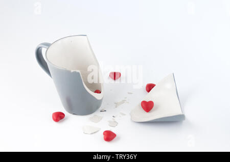 Broken dishes. Broken feelings and attitudes. Front view Stock Photo