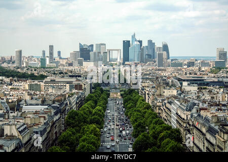 PARIS, FRANCE - JULY 11, 2011: La Defense Business district with its Arch (Grande Arche) and skyscrapers seen from the Axe Historique, with the Avenue Stock Photo