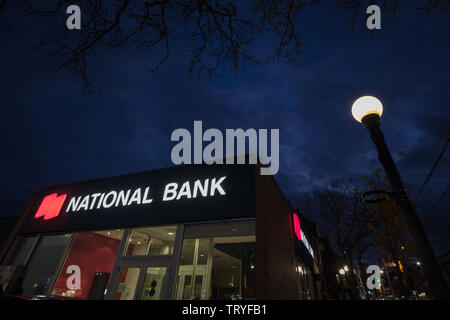 TORONTO CANADA - NOVEMBER 14, 2018: Logo of the National Bank of Canada, in Toronto, Ontario, at night. It is one of the largest Canadian banks, and o Stock Photo