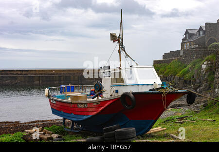Inshore Fishing Boat in Harbour at Craster on the Northumberland Coast England United Kingdom UK Stock Photo