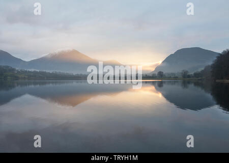 Sunrise over Loweswater, a lesser known lake is the Lake District, England Stock Photo