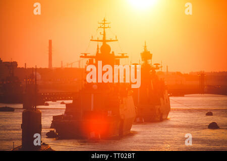 A line of modern russian military naval battleships, frigates, warships in the row, northern fleet and baltic sea fleet preparing to military parade Stock Photo