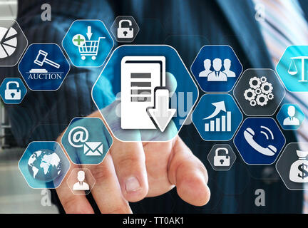 The businessman chooses Document management system, DSM on the virtual screen in social network connection. Stock Photo