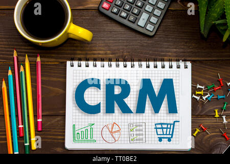 CRM. Customer Relationship Management. Tablet on the office Desk Stock Photo