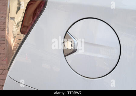 Recharging Outlet Door on an Electric Car Rear Fender, USA Stock Photo