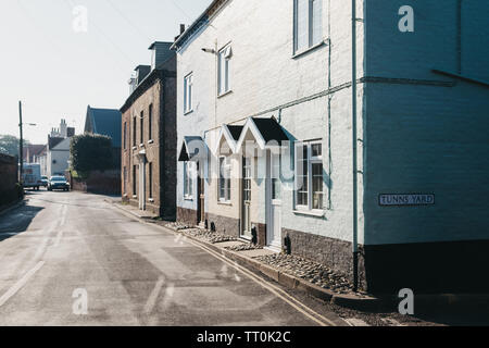 Wells-next-the-sea, UK - April 20, 2019: Row of typical British houses in Wells-next-the-sea, a seaside town and port in Norfolk, UK, famous for its b Stock Photo