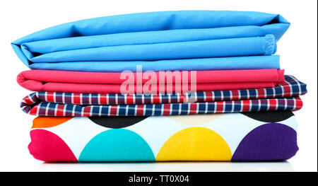 Pile of colored fabrics isolated on white Stock Photo